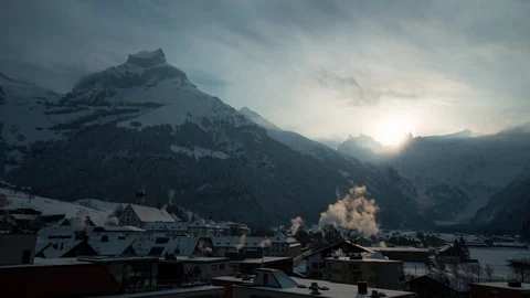 Dramatic Timelapse of snow clouds travelling across sky in Swiss mountains Stock Footage 129099598