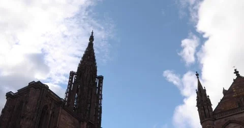 Dramatic timelapse of Strasbourg Cathedral spire under a dynamic sky Stock Footage 318074115