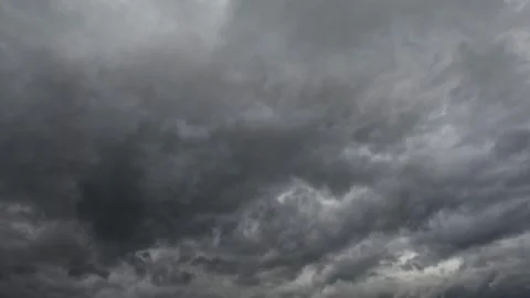 Dramatic timelapse of thick black clouds in the afternoon sky Stock Footage 321325937