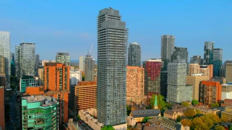 Dramatic toronto skyline revealing modern skyscrapers rising above business Stock Footage 307553186