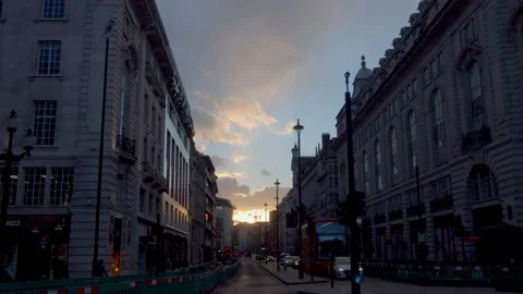 Dramatic tracking shot looking down Piccadilly in central London at sunset Stock Footage 148627820