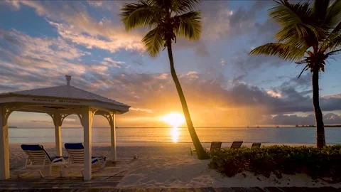 A dramatic, tropical sunset time lapse in the Caribbean Sea Stock Footage 188996879