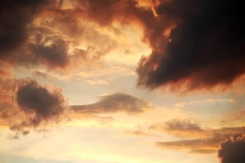 Dramatic twilight sky with clouds. Colorful cloudscape and atmosphere Stock Photos
