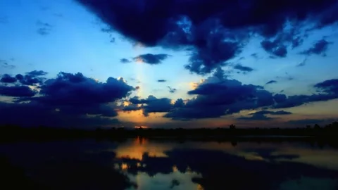 Dramatic Twilight Sky over Calm Water Stock Footage 310817755