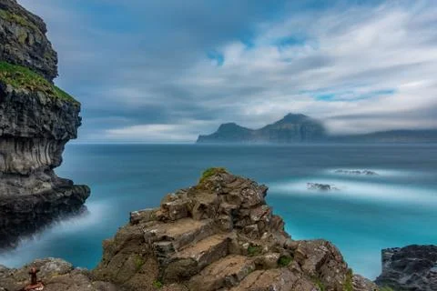 Dramatic ultra long exposure of viewpoint over the ocean Stock Photos