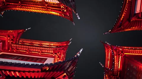 Dramatic Upward View of Illuminated Red Roofs in Chinese Architecture Stock Footage 337411311