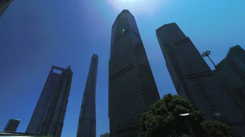 A dramatic upward view of towering skyscrapers in Shanghai's business distr.. Stock Footage 287016612