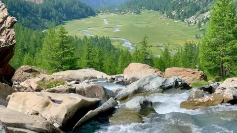 Dramatic Val Masino Alpine scenery landscape with flowing cold water snake Stock Footage 160772433