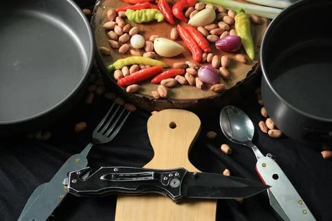 Dramatic vegetable ingredients and set utensils Stock Photos