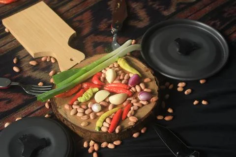 Dramatic vegetable ingredients and set utensils Stock Photos