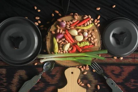 Dramatic vegetable ingredients and set utensils Stock Photos