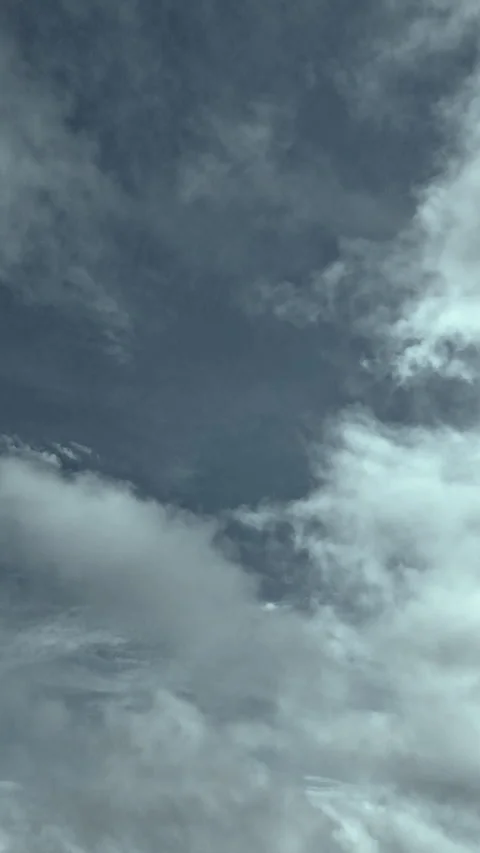 Dramatic vertical 2k aerial cloud hyperlapse Stock Footage 338401216