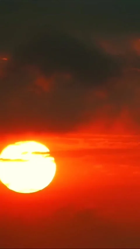 Dramatic Vertical Golden Sunset with Sun Rays and Clouds Stock-Footage 333920244