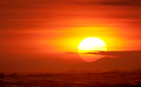 Dramatic vibrant sunset in hawaii Stock Photos