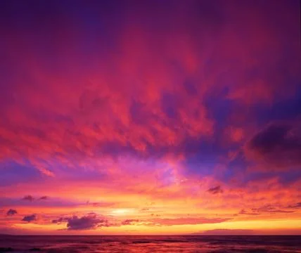 Dramatic vibrant sunset in hawaii Stock Photos