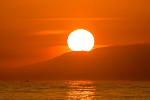 Dramatic vibrant sunset in hawaii Stock Photos