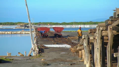 Dramatic video of a working salt mine on the caribbean coast in dominican republ Stock Footage 146625136