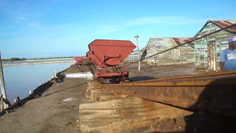 Dramatic video of a working salt mine on the caribbean coast in dominican republ Stock Footage 146661988