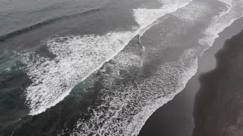 Dramatic view - big dark waves crash on the sandy beach Stock Footage 139817237
