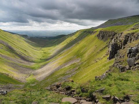 Dramatic view from High Cup Nick of chasm, Eden Valley, North Pennines, Cumbria Stock Photos