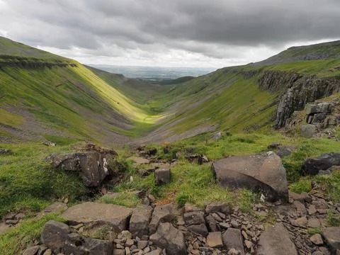 Dramatic view from High Cup Nick of chasm, Eden Valley, North Pennines, Cumbria Stock Photos