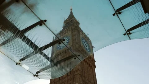 Dramatic view of the iconic Big Ben clock tower in London, shot through a mod Stock Footage 318212190