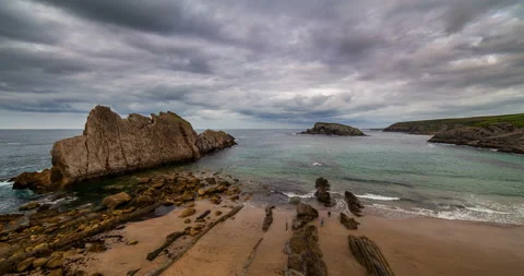 Dramatic view of Playa de la Arnia, Cantabria, Spain. Timelapse. Stock-Footage 98660446