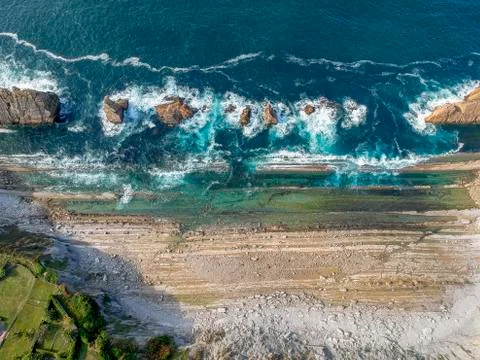 Dramatic view of Playa de la Arnia, rocky coastline in Santander ,Cantabria 库存照片