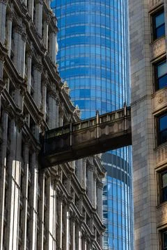 A dramatic view of a sky bridge connecting buildings in the city of Chicago, USA Stock Photos