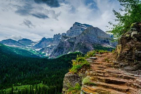  Dramatic view of a storm clouds around a bend of the Grinnell Glacier Stock Photos