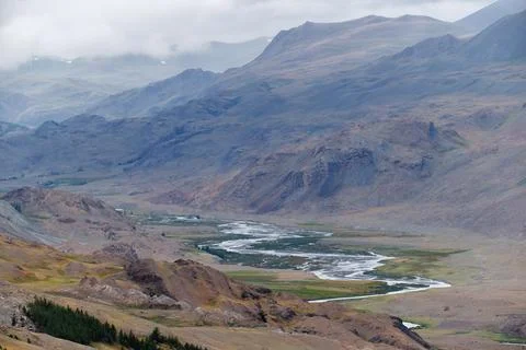 Dramatic view on wild altai mountains. In the background is the valley of t.. Stock Photos