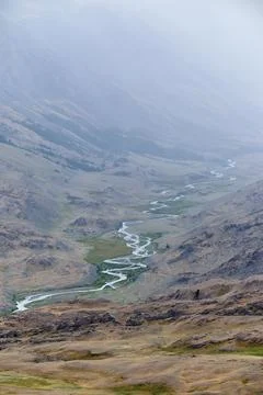 Dramatic view on wild altai mountains. In the background is the valley of t.. Stock Photos