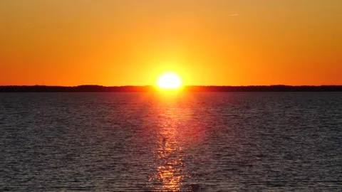 Dramatic vivid orange tropical sunset with reflection on the sea Stock-Footage 150198538