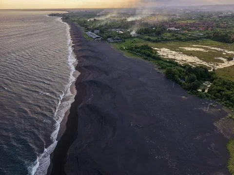 Dramatic volcanic black sand beach and coastline in Karangasem, Bali Stock Photos