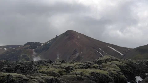 Dramatic Volcanic Peak and Mossy Lava Fields in Landmannalaugar, Iceland Stock Footage 339963748