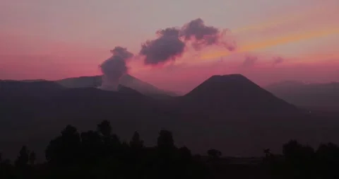 Dramatic Volcanic Smoke at Sunset – Mount Bromo 4K Drone Footage Stock Footage 329260199