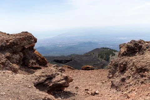 Dramatic volcanic terrain on a mountain peak with a panoramic view Stock Photos