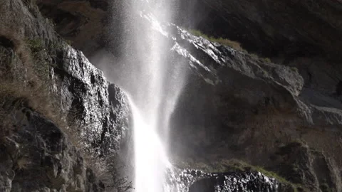 Dramatic Waterfall Cascading Down Rocks – Slow Motion Video stock 318844311
