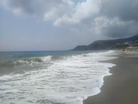 Dramatic waves crashing on Cleopatra beach coastline in Alanya Stock Photos