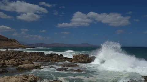 Dramatic Waves Crashing on Rocky Coastline UHD 60fps Video stock 317767139