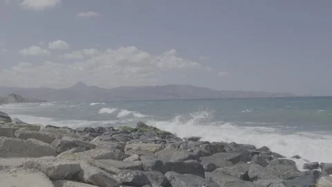 Dramatic Waves Crashing on Rocky Coastline 8K 30 fps Video stock 317767679