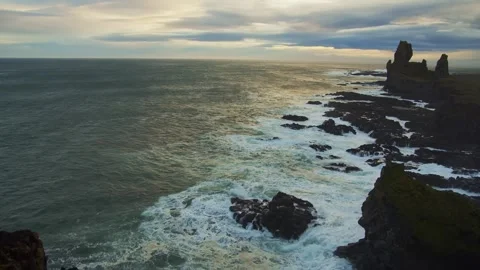 Dramatic Waves Crashing on a Rocky Icelandic Coastline Stock Footage 320202149