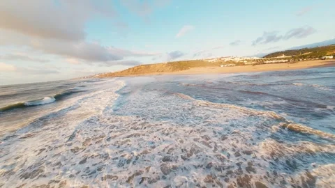 Dramatic waves meet rugged coast Stock Footage 340914130
