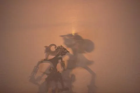 Dramatic Wayang Kulit Puppet Shadows in Traditional Theater Stock Photos