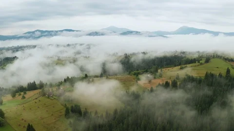 Dramatic weather in the mountains after rain. Fog in the mountains, aerial view Video stock 126033332
