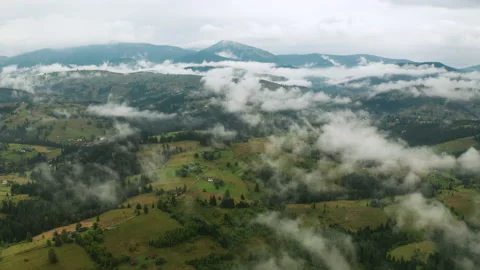 Dramatic weather in the mountains after rain. Fog in the mountains, aerial view Video stock 134002206