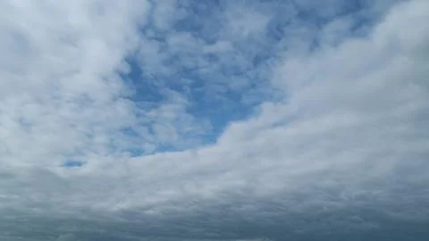 Dramatic white and gray cloud. Light puppy fluffy cirrocumulus cloudscape in 写真素材