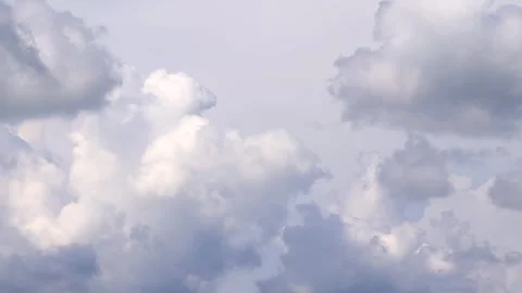 Dramatic White Clouds Filling a Bright Blue Sky Stock Footage 346237255