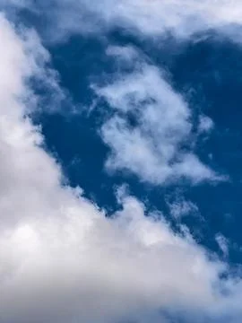 Dramatic White Clouds Framing Deep Blue Sky Stock Photos
