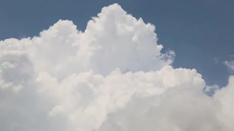 Dramatic White Clouds Over A Bright Blue Sky Stock Footage 344073132
